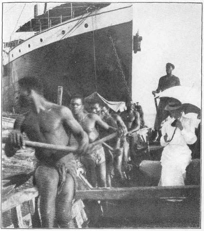 The Kroo Boys Sit, Not On the Thwarts, but On the
Gunwales, as a Woman Rides a Side Saddle.