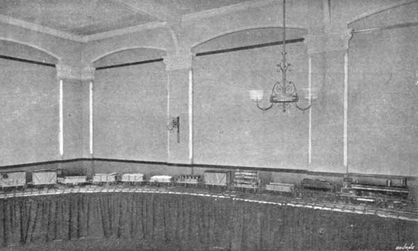 THE HEAVY GOODS TRAIN&mdash;THE TRUCKS LOADED WITH
MERCHANDISE.