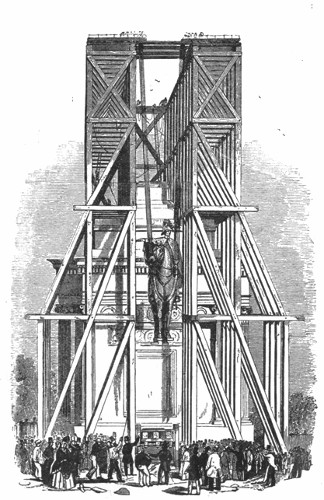 HOISTING THE STATUE TO THE TOP OF THE ARCH.

From the "Illustrated London News."