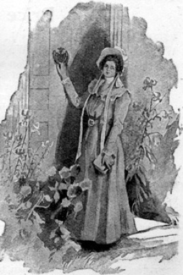 A young girl
wearing a long cloak and hat