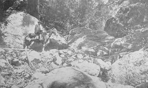 OUR ARTIST AMONG THE BOUNDERS. Bridle Road through
Castle Canyon, near Echo Mountain House, Mount Lowe.