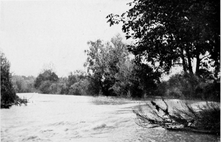 The Little Miami River at Eureka Mills, twelve miles
east of Dayton. Here the ruin of the dam, which served the mills run by
Mr. Howells’s father, makes a rapid in the stream.
