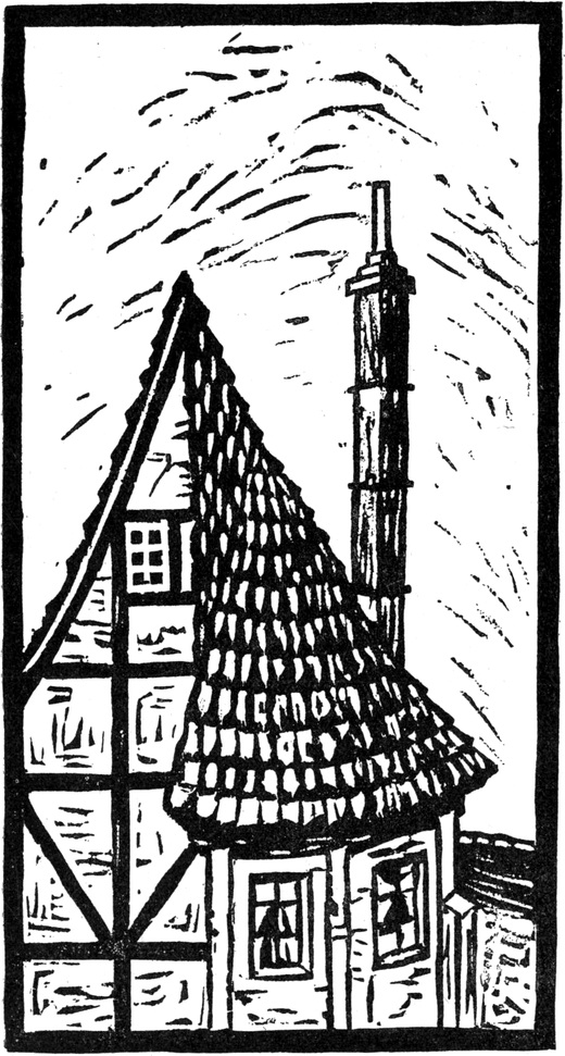 Vorderfront eines Hauses mit
  überdachtem Erker